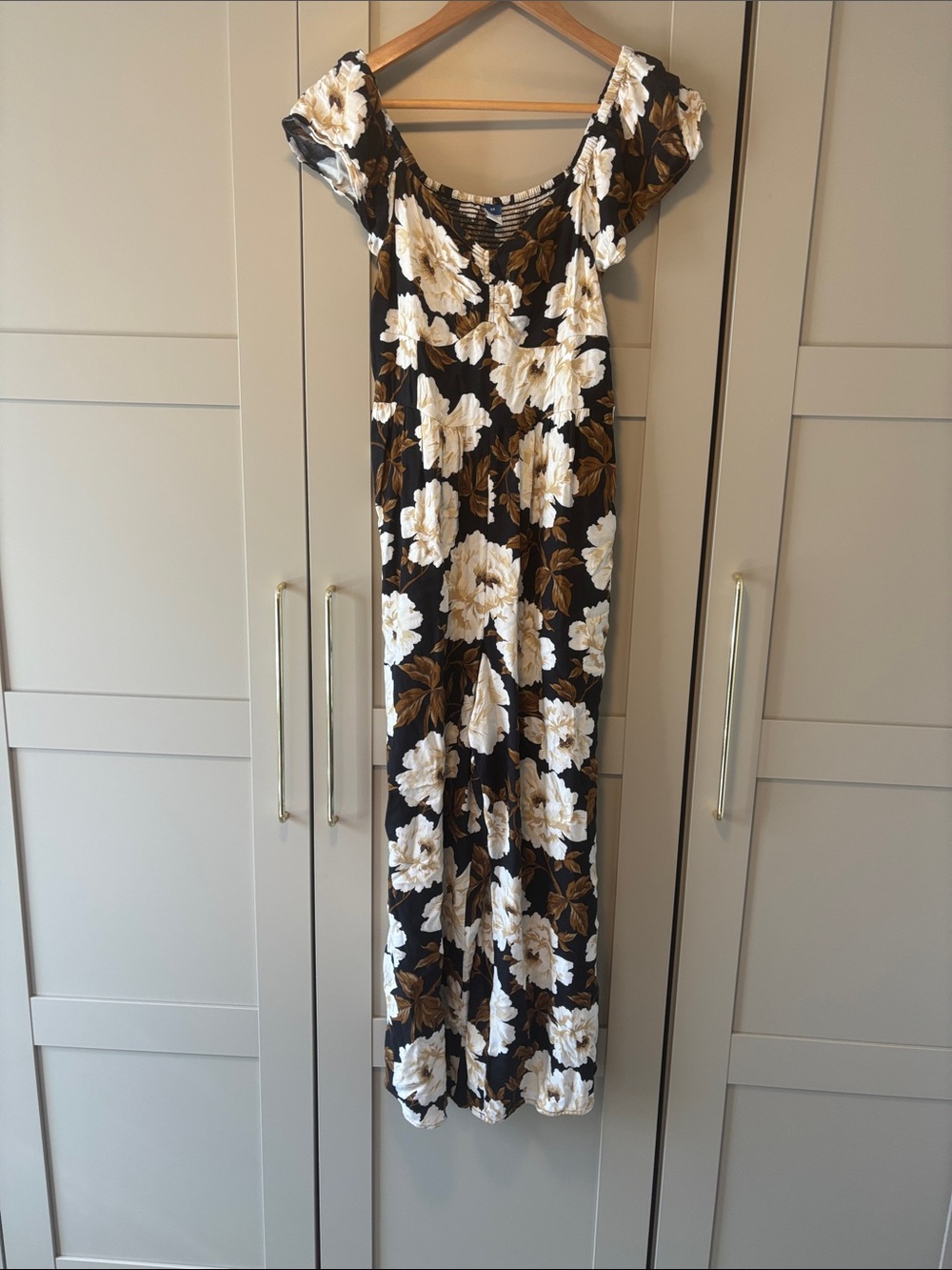 Old Navy Black Jumpsuit with White Floral Print and Brown Leaves